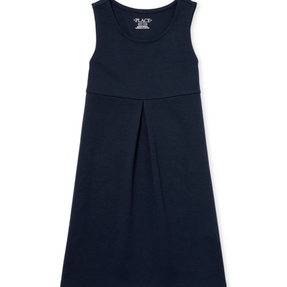 Girl’s Navy knit jumper dress.